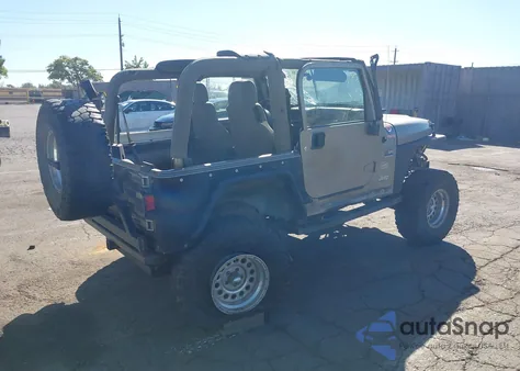 2003 Jeep Wrangler Sahara z USA, uszkodzony, nr VIN 1J4FA59S43P305628